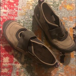 Merrell slip on walking shoes.Vibram soles.